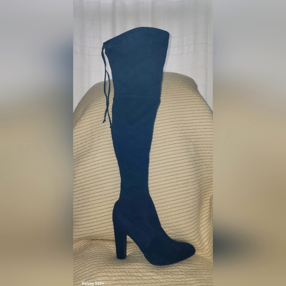 Beautiful velvet blue knee high fitted boots.  MINT condition.